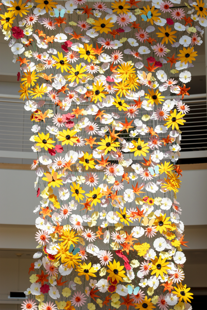 FlowerFall, a 40-foot-high flower installation in the Talent Plus atrium.