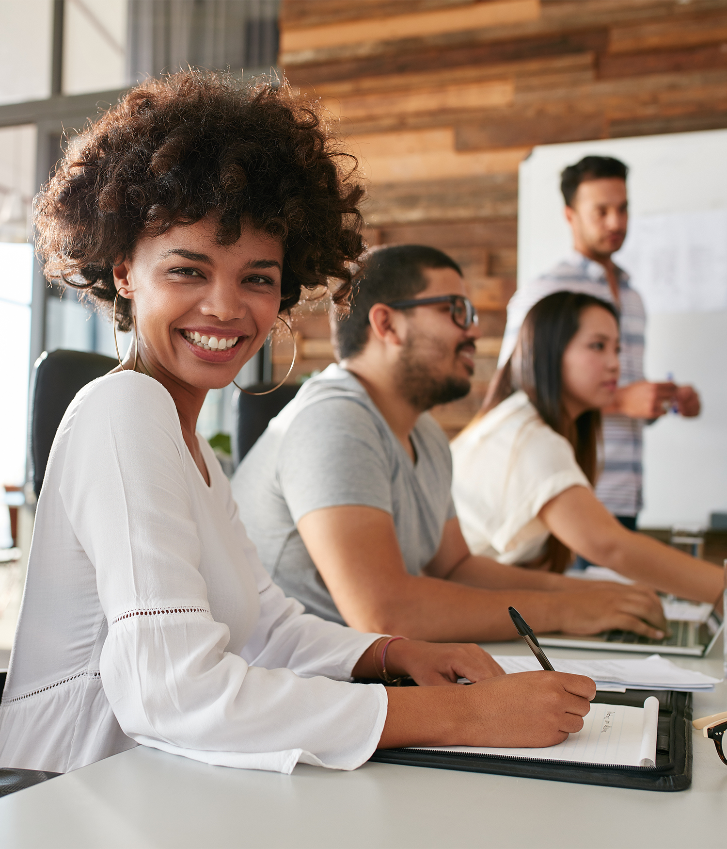 Woman participating in development session at work.